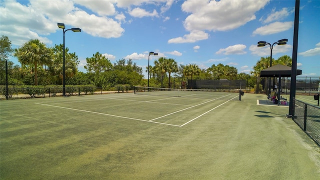 view of tennis court with basketball court