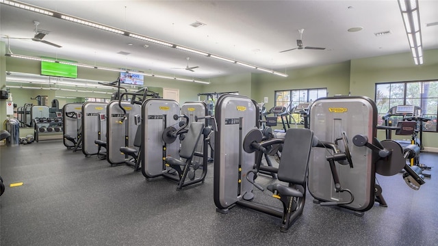 exercise room with ceiling fan