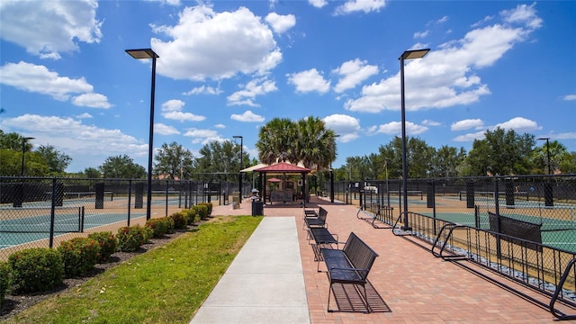 surrounding community featuring a gazebo and tennis court