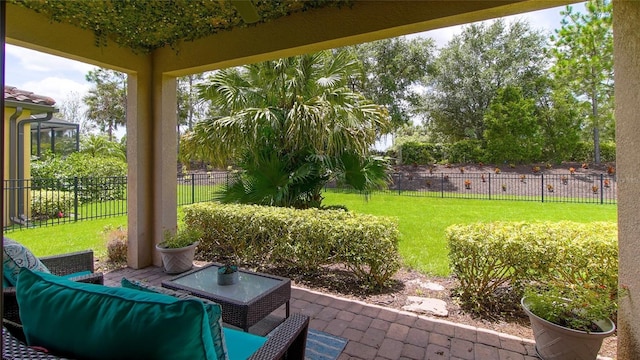 view of patio with a fenced backyard and an outdoor living space