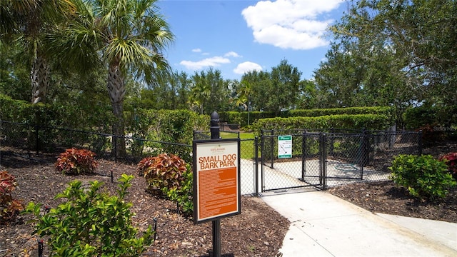 exterior space with fence and a gate