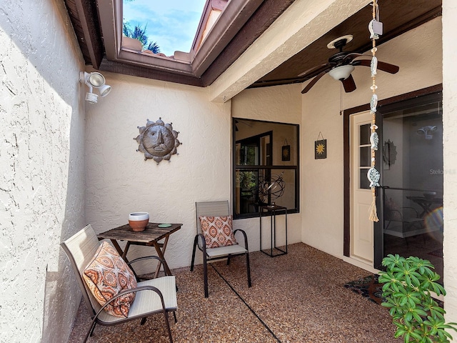 view of patio / terrace featuring ceiling fan