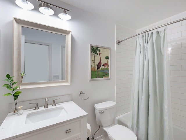 full bathroom featuring vanity, toilet, and shower / bathtub combination with curtain