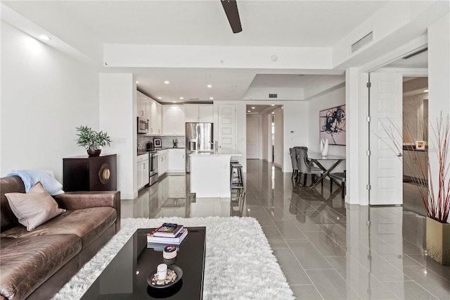 living room featuring tile patterned flooring