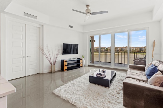 living room featuring ceiling fan