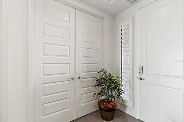 foyer entrance featuring tile patterned floors