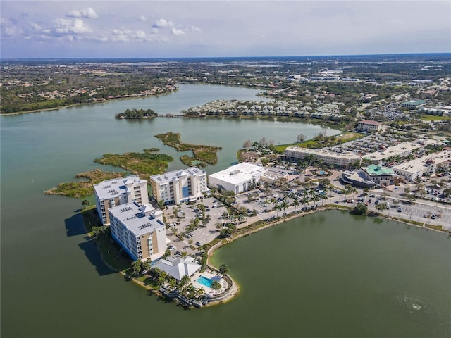 birds eye view of property featuring a water view