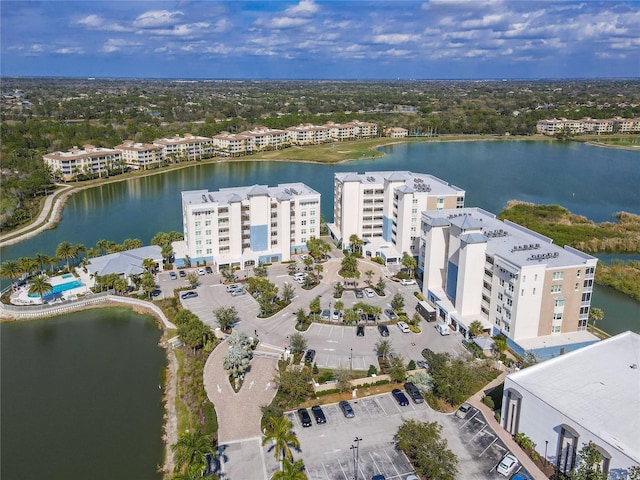 drone / aerial view with a water view