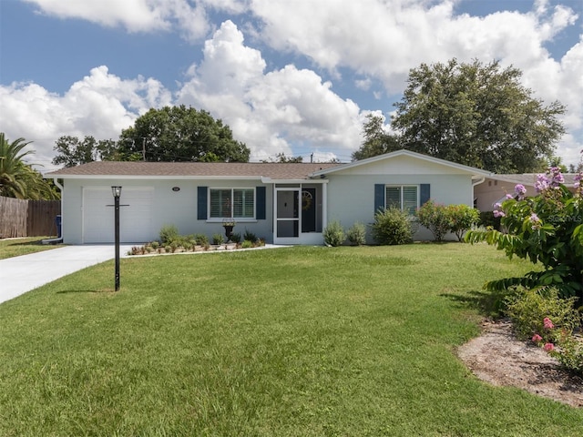 ranch-style house with a front yard and a garage