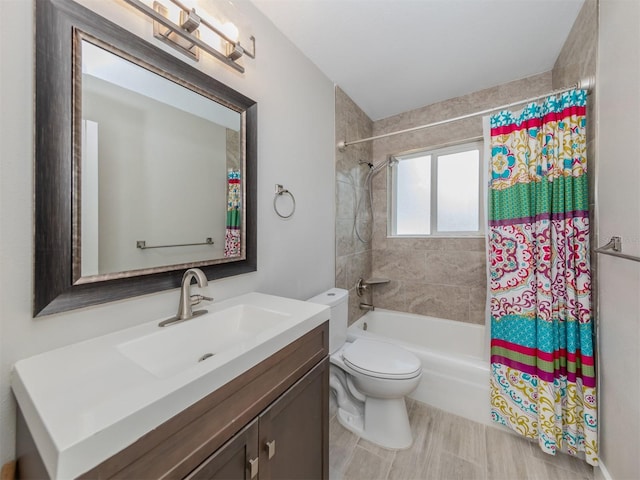 full bathroom featuring shower / bath combo, toilet, and vanity