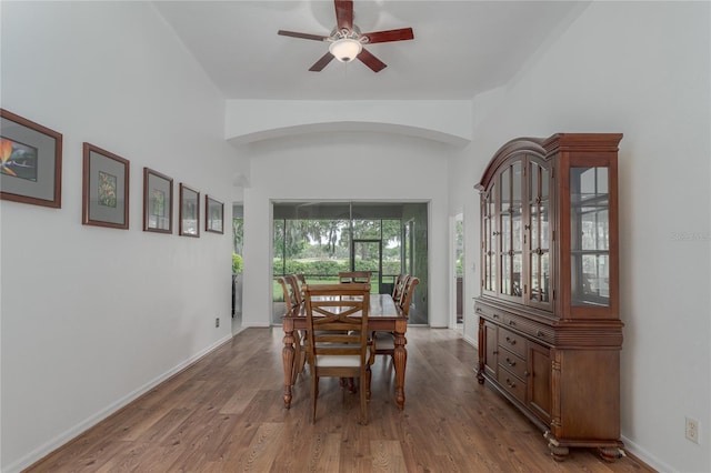 dining space featuring ceiling fan and hardwood / wood-style floors