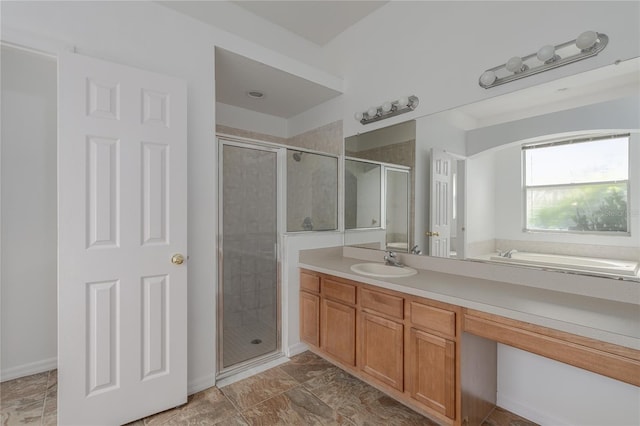 bathroom with vanity and a shower with door