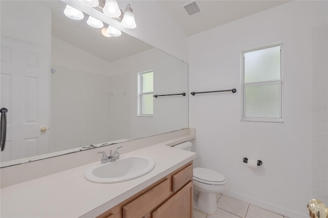 bathroom with tile patterned floors, vanity, a shower, toilet, and lofted ceiling