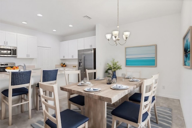 dining area with a chandelier