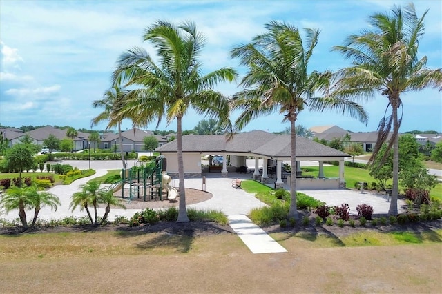 view of property's community featuring a playground