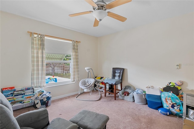 playroom with carpet flooring and ceiling fan