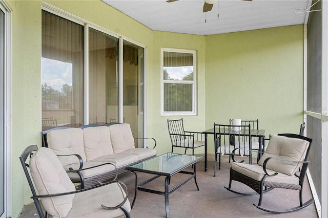 exterior space featuring outdoor lounge area and ceiling fan