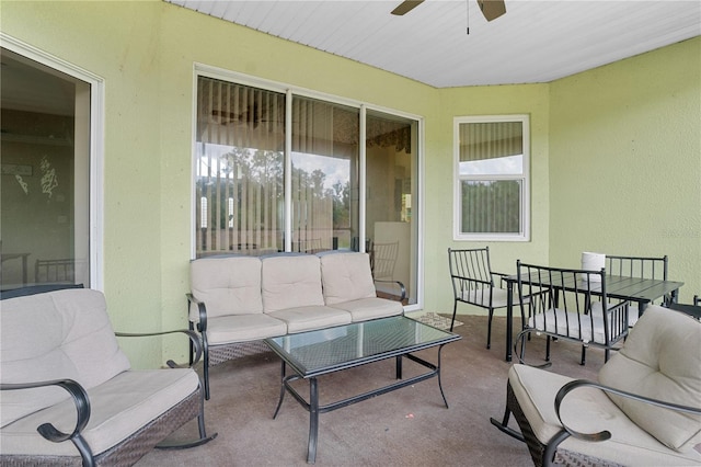 view of patio featuring an outdoor hangout area and ceiling fan