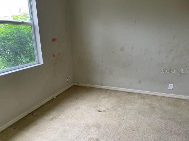 view of carpeted spare room