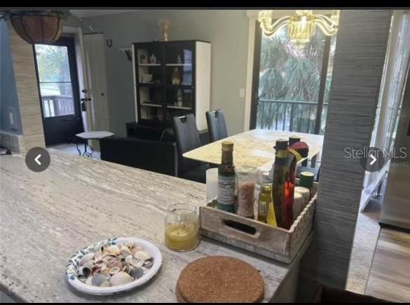 dining space with a chandelier