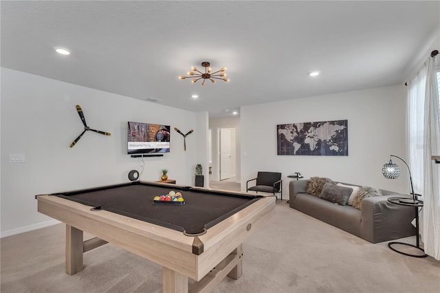 recreation room with light carpet and pool table