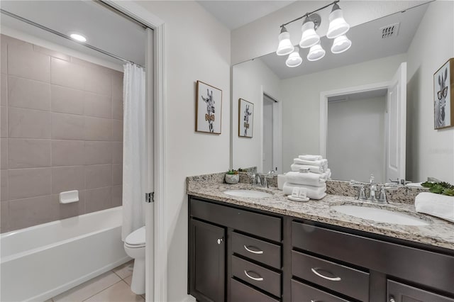 full bathroom with tile patterned flooring, vanity, shower / tub combo with curtain, and toilet