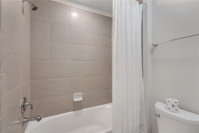 bathroom with toilet and shower / bathtub combination with curtain