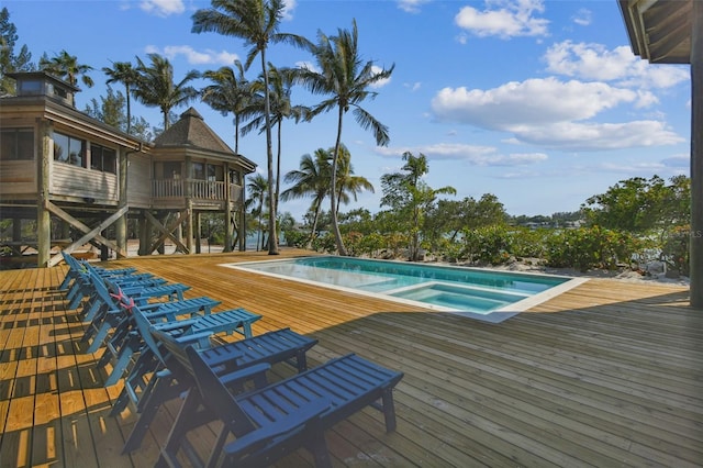 view of swimming pool with a wooden deck