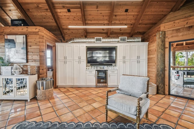 kitchen with white cabinets, wood ceiling, beverage cooler, and wood walls