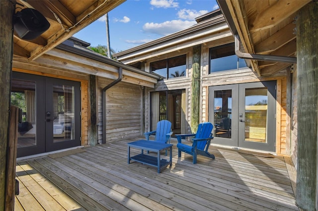 wooden terrace featuring french doors