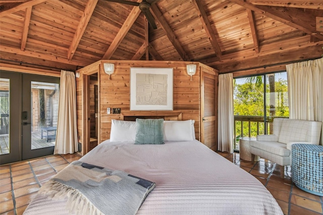 bedroom with access to exterior, french doors, wooden ceiling, tile patterned flooring, and beamed ceiling