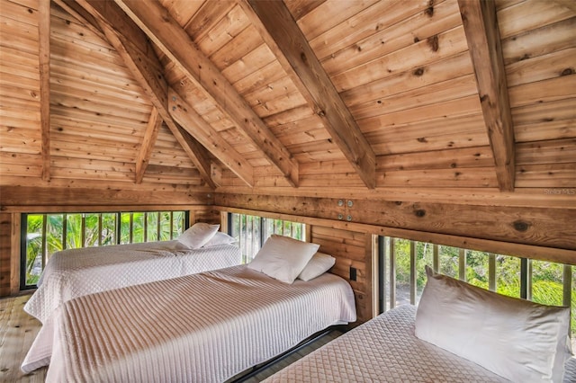 unfurnished bedroom featuring hardwood / wood-style floors, vaulted ceiling with beams, wood ceiling, and wooden walls