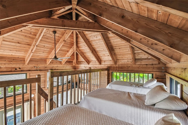 unfurnished bedroom with vaulted ceiling with beams, wood walls, and wood ceiling