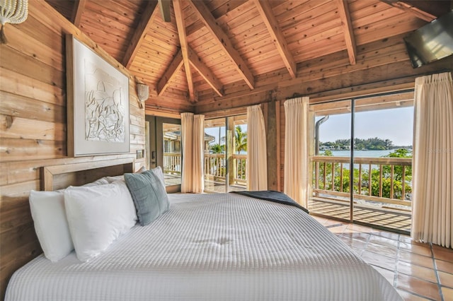 unfurnished bedroom featuring access to exterior, vaulted ceiling with beams, wooden walls, a water view, and wood ceiling