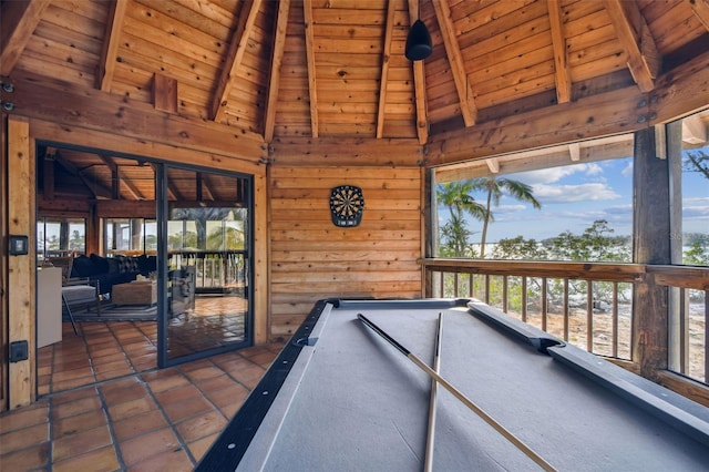 playroom featuring dark tile patterned floors, wooden ceiling, billiards, vaulted ceiling with beams, and wood walls