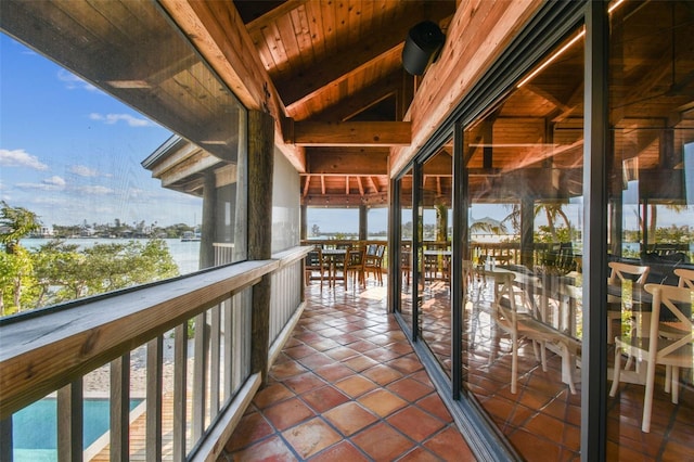 balcony featuring a water view