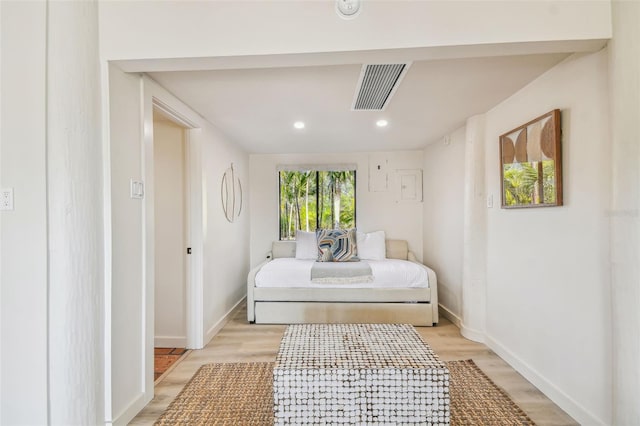 bedroom with light hardwood / wood-style flooring