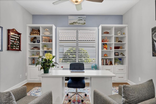 home office featuring ceiling fan and wood-type flooring