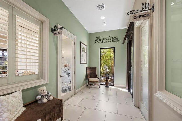 living area with light tile patterned flooring