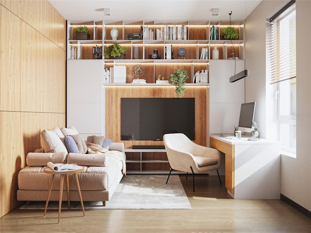 sitting room with light hardwood / wood-style floors