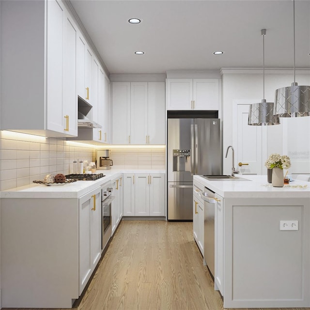 kitchen with white cabinetry, light hardwood / wood-style flooring, backsplash, pendant lighting, and appliances with stainless steel finishes