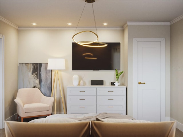 sitting room featuring crown molding