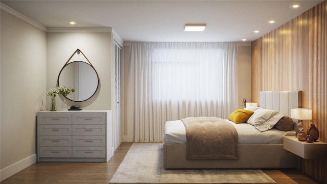 bedroom with ornamental molding and dark wood-type flooring