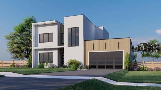 modern home featuring a front lawn and a garage