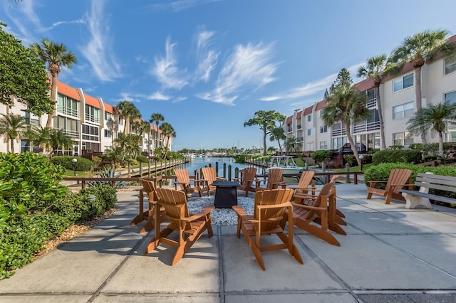 view of patio featuring a water view