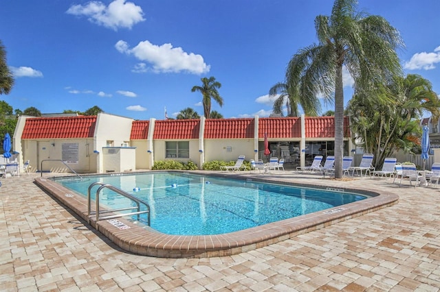 view of swimming pool featuring a patio