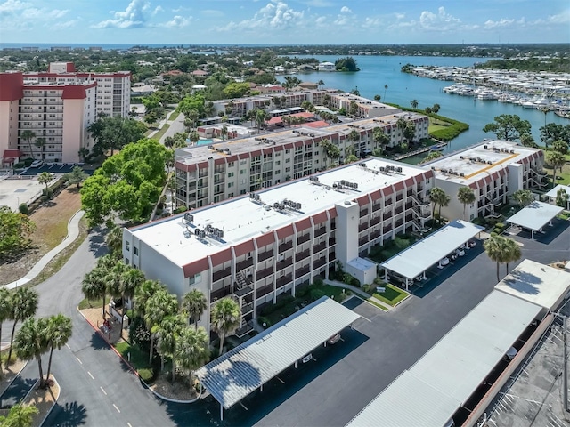 birds eye view of property featuring a water view