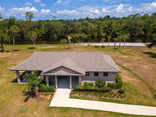 drone / aerial view featuring a water view