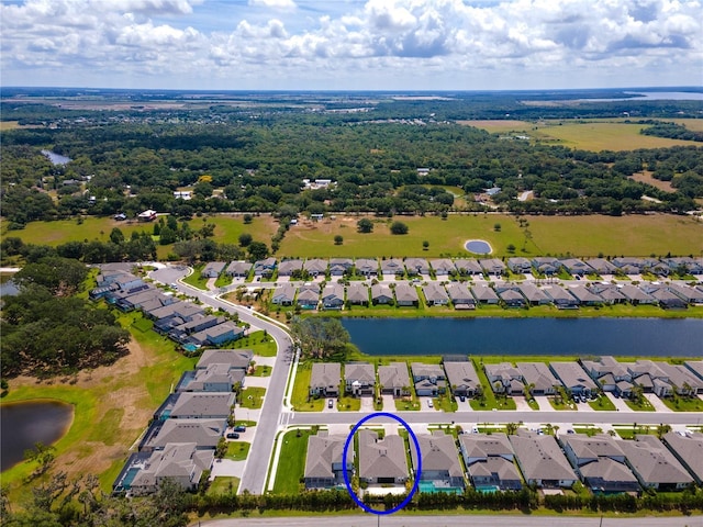 drone / aerial view featuring a water view