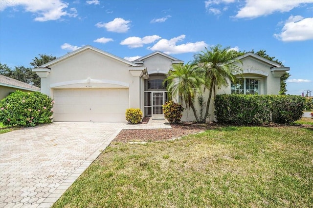 ranch-style house with a front lawn and a garage